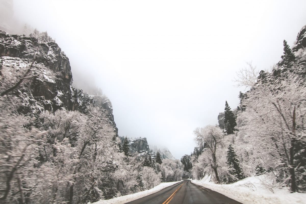 highway through snowy mountains