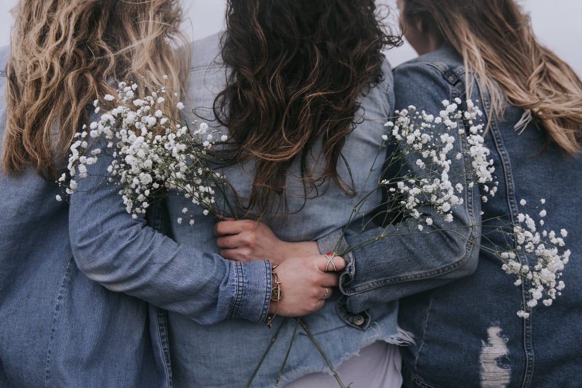 3 women hugging