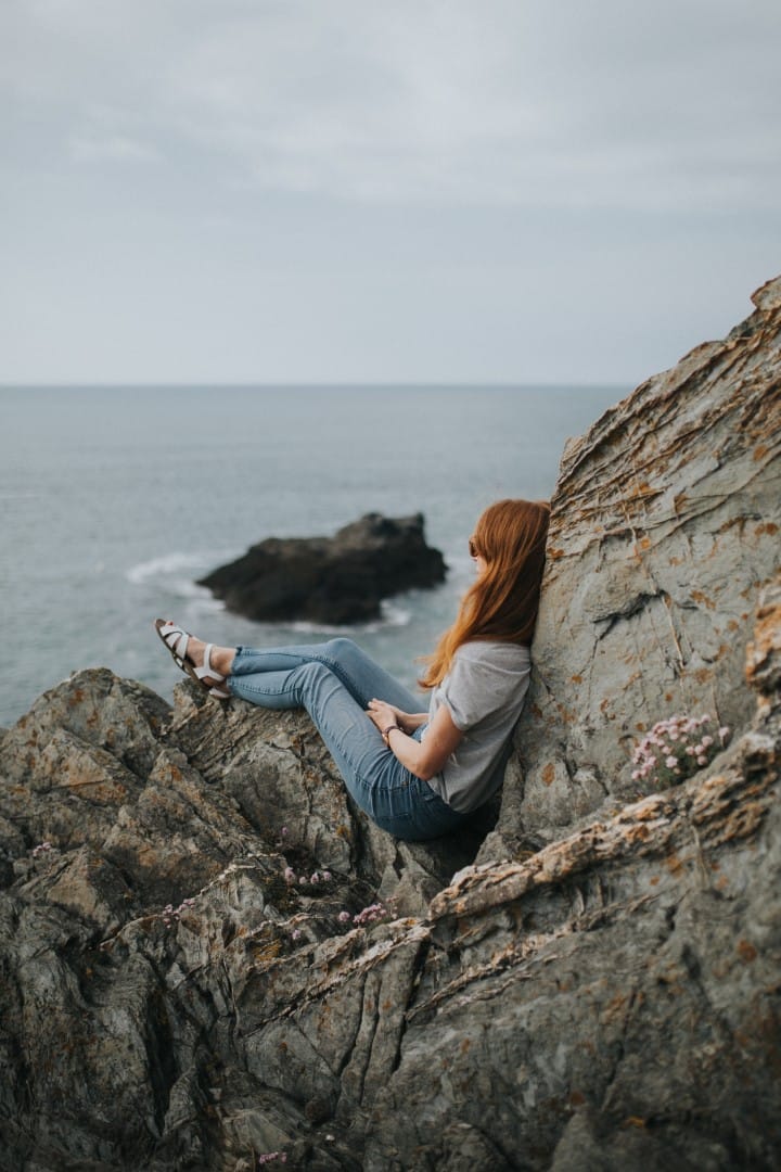 woman still on rock