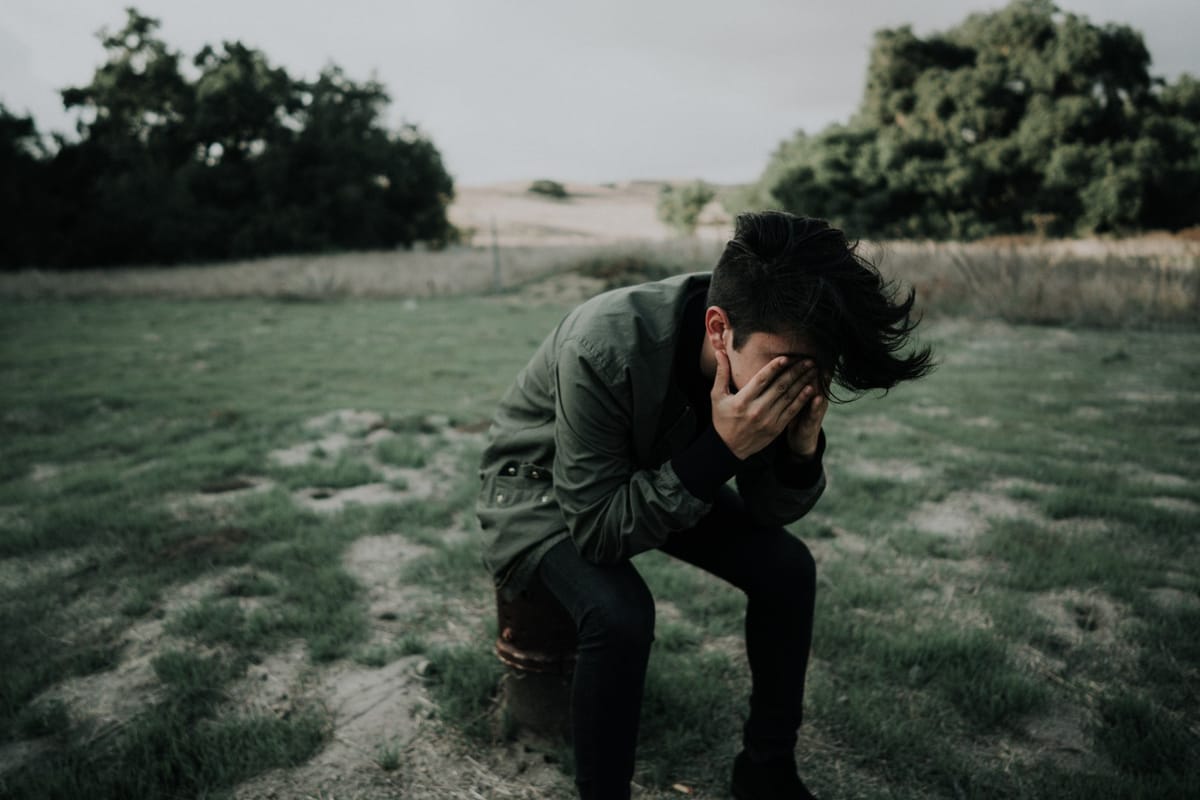 man kneeling