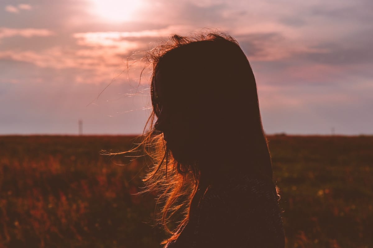 woman sad hit rock bottom