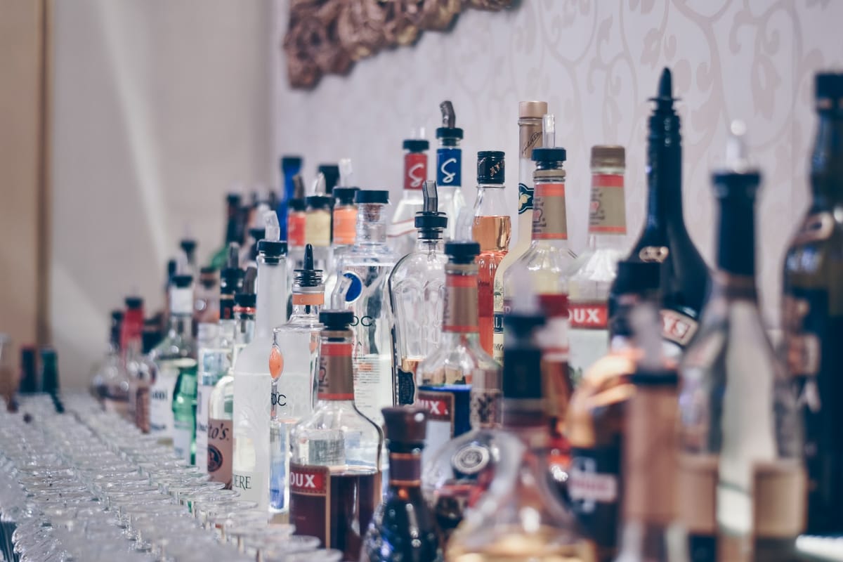 alcohol bottles at bar