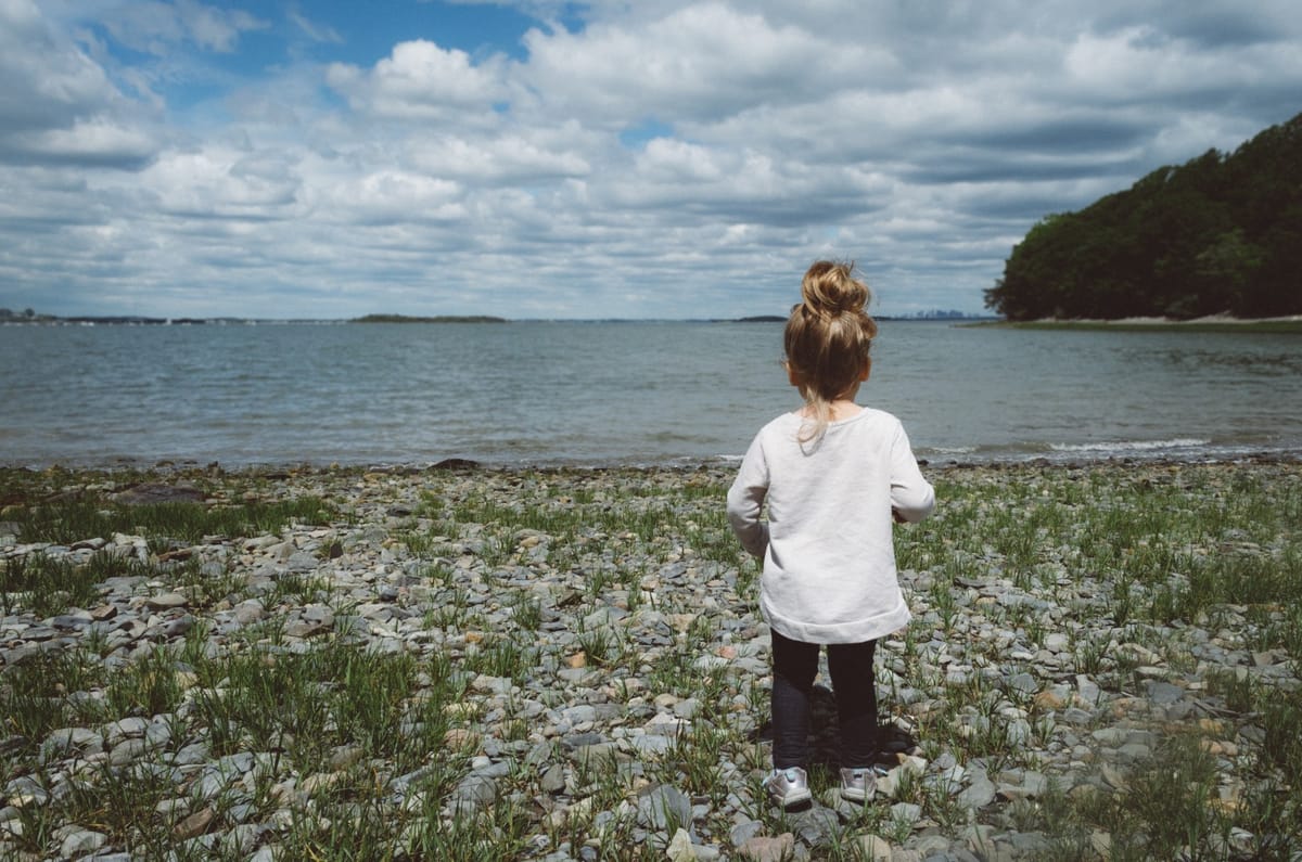 little girl wondering