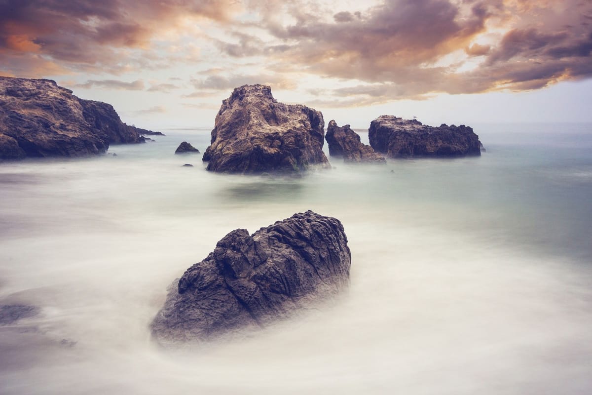 rocks with fog rolling in