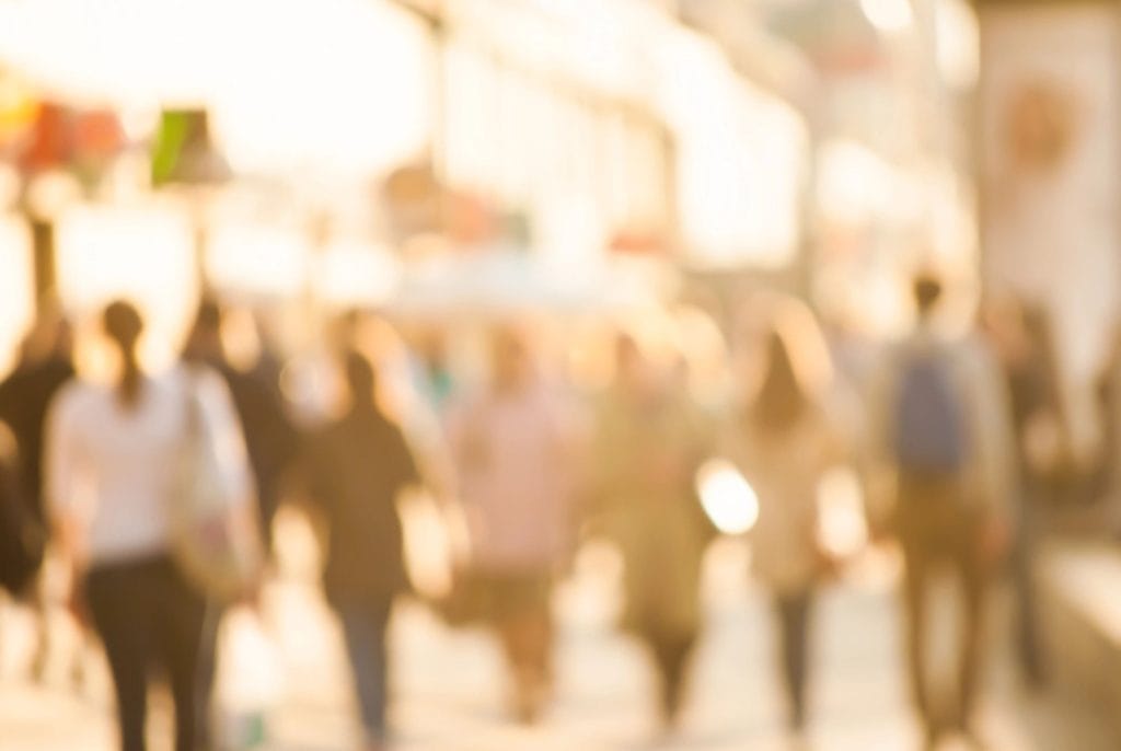blurred people walking