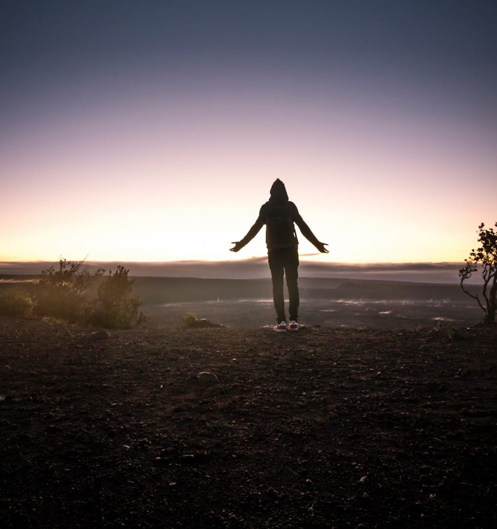man standing at sunset