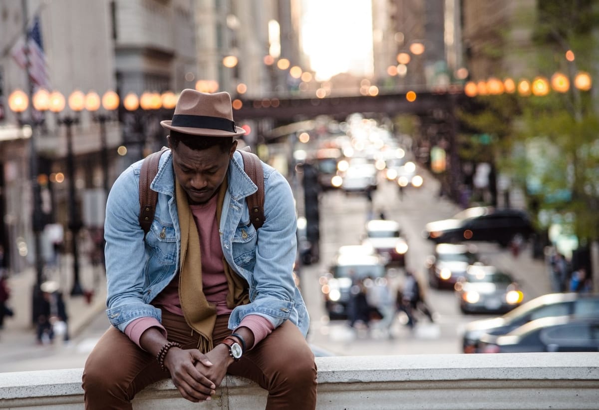 man sitting with grief