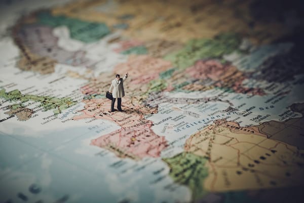 man standing on map