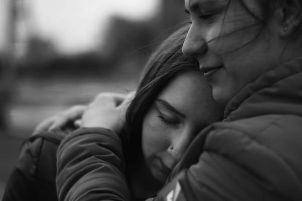 women hugging