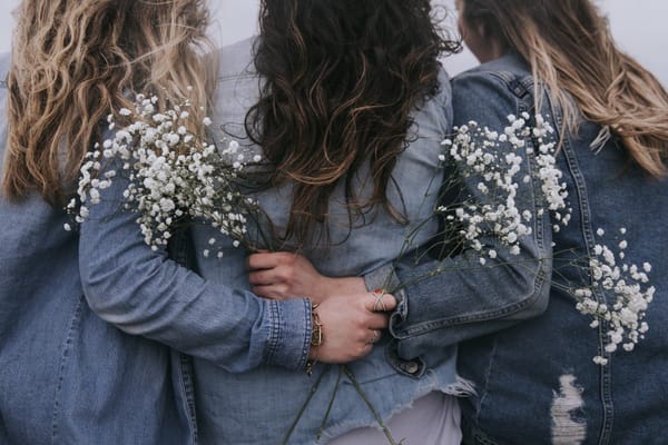 3 women hugging