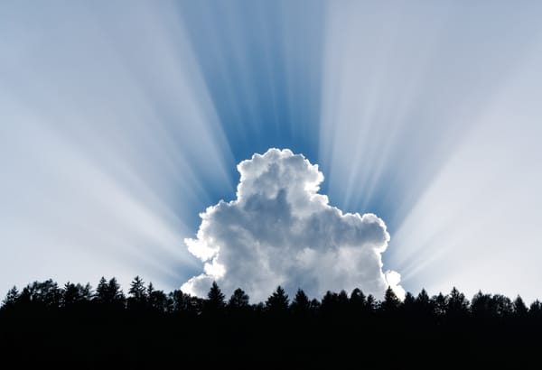 sun behind clouds