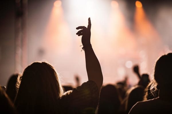 woman praising hands up