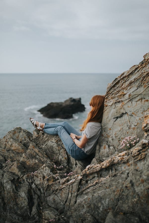 woman still on rock