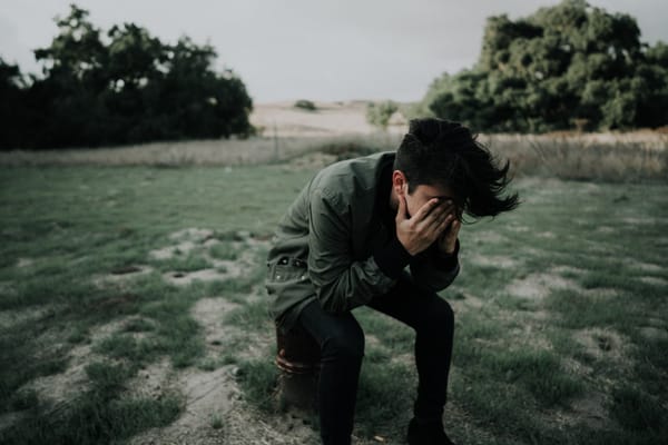 man kneeling