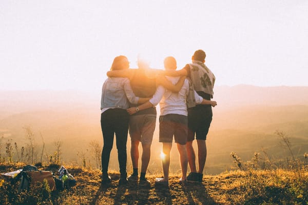 group of friends hugging