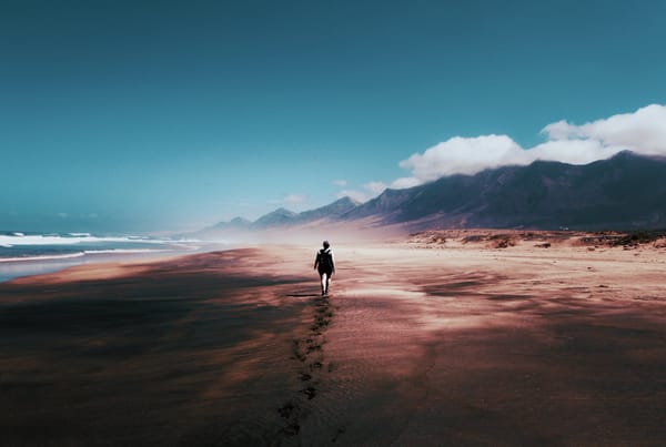 woman walking on beach