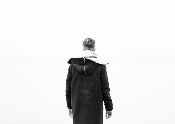 back of man wearing coat