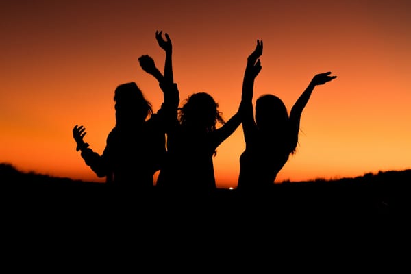 silhouette ladies praising