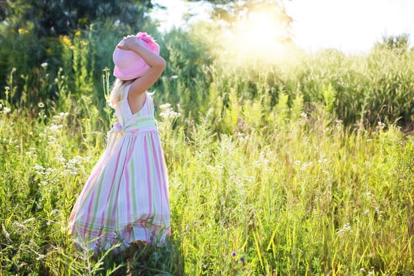 little girl in field