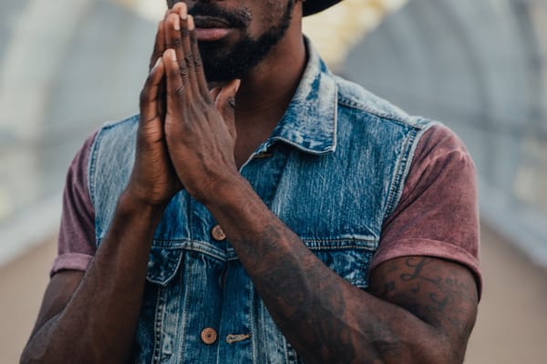 man praying small prayers