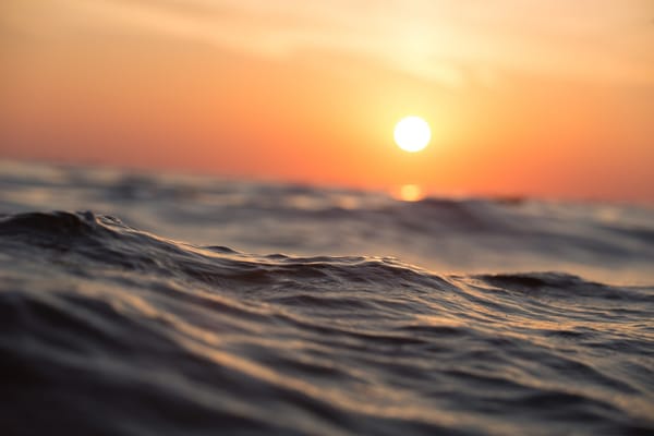 waves at sunset