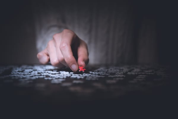 man with puzzle piece