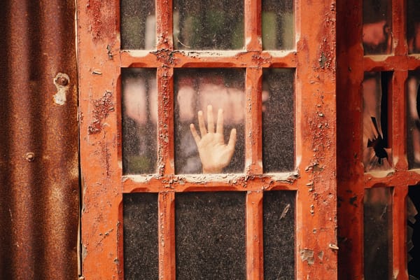 hand on frosted glass